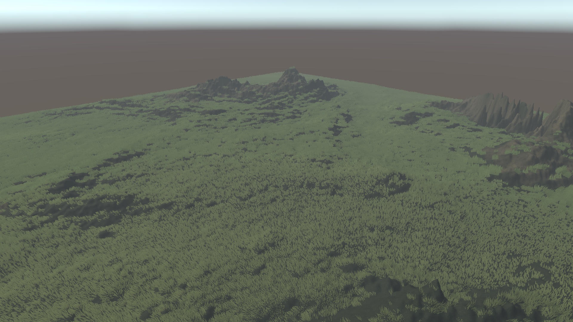 Wide rocky Unity terrain covered by Kiwi Grass